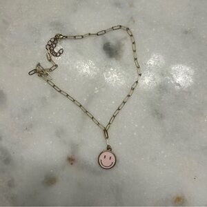 Pink smiley face necklace